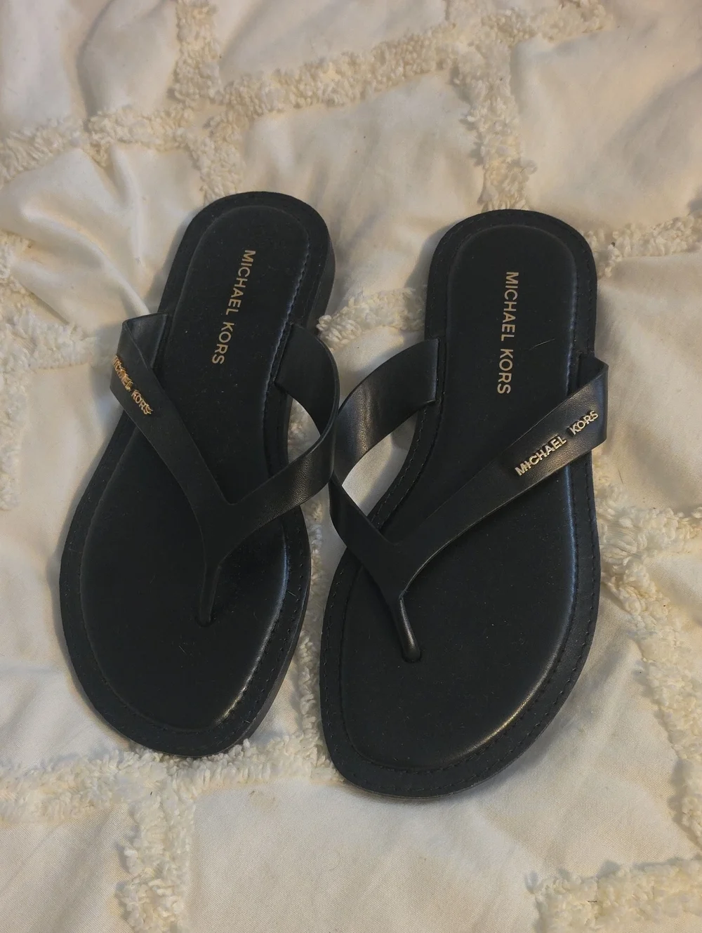 Michael Kors Black Slip-On Thong Sandals with Gold Logo